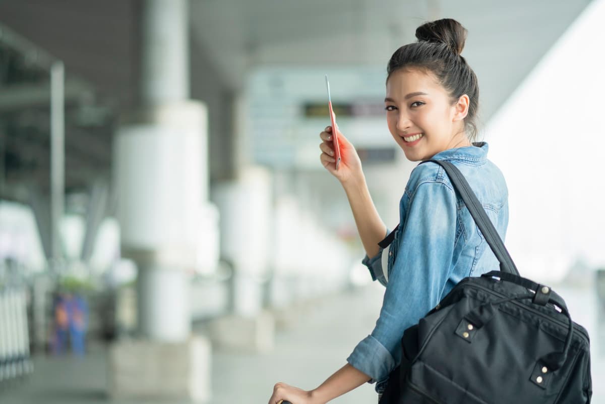 Traveller walking through a transit building